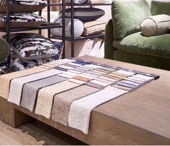 Upholstery fabric swatches in THG showroom