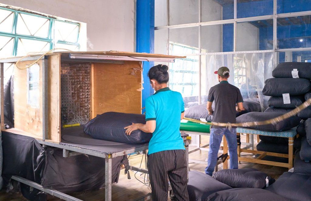 Cushion filling machine in THG upholstery line
