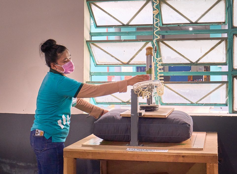 Sofa cushion filling at THG factory