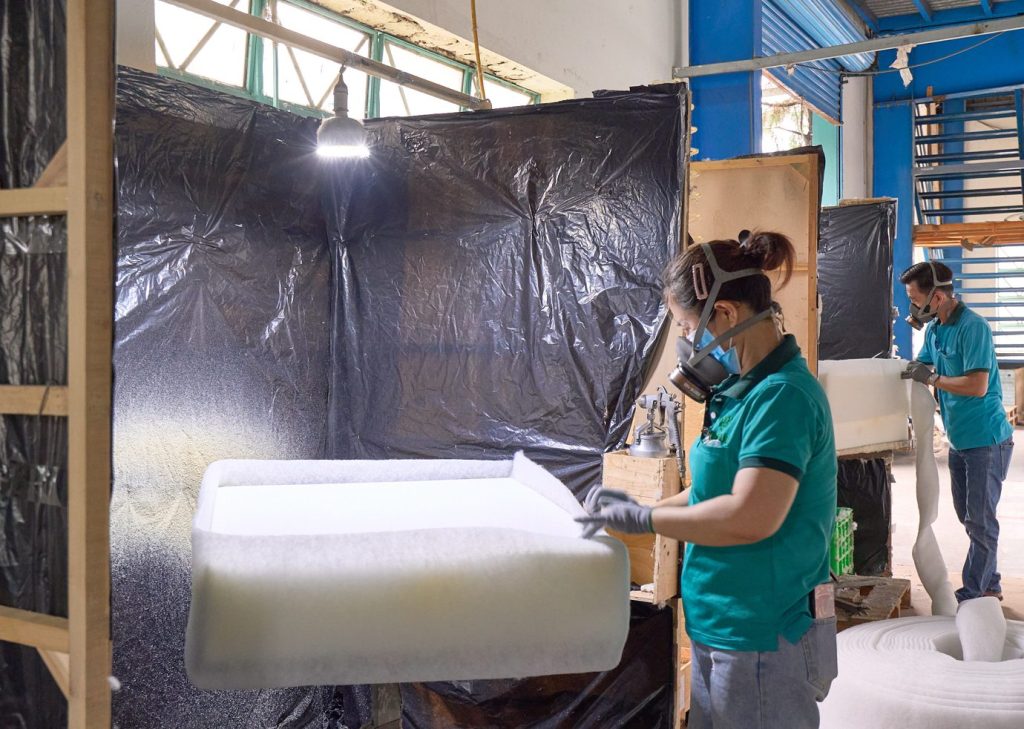 Spray gluing foam onto sofa frame